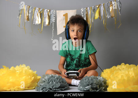 Young man playing games long hours Stock Photo