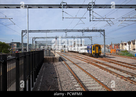 An Arriva Northern Rail class 158 diesel train departing from  Blackpool North with the  0905 Blackpool North to York Stock Photo