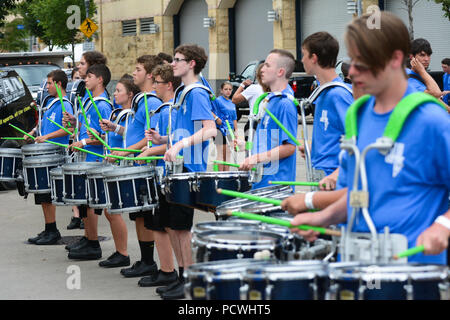 A line of drummers in a high school band. Stock Photo