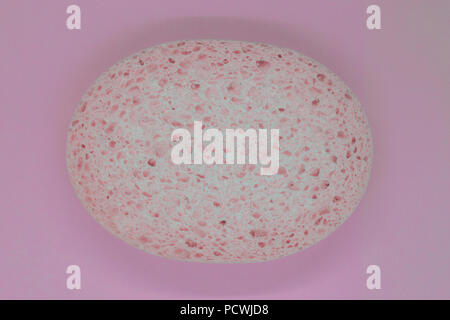 Abstract composition of pink sponge on pink background surface Stock Photo