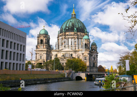 Beautiful view of Berliner Dom (Berlin Cathedral) at famous Museumsinsel (Museum Island) with excursion boat on Spree river in beautiful  Berlin. Germ Stock Photo