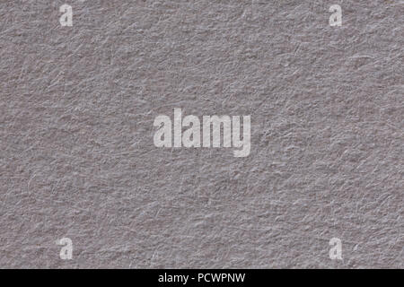 Grey paper texture as background.  Stock Photo