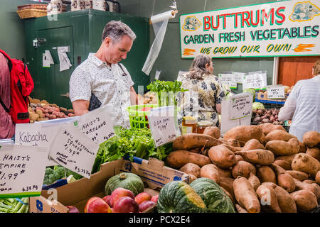 middle aged man shopping in a local famers market Stock Photo