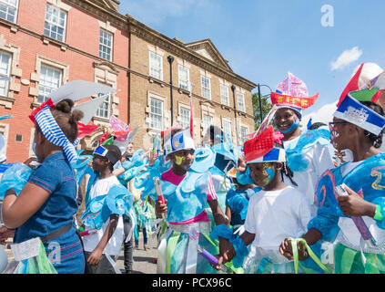 Stockton International Riverside Festival, Stockton on Tees, England. United Kingdom. 4th August 2018. UK weather: glorious sunshine for the community carnival parade at the 31st Stockton International Riverside Festival. Credit: ALAN DAWSON/Alamy Live News Stock Photo