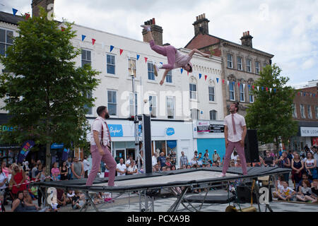 Stockton International Riverside Festival, Stockton on Tees, England. United Kingdom. 4th August 2018. UK weather: cooler weather for the acrobatic group,Max Calaf Seve, who performed DIP, which included air twisting stunts on the trampoline, mixed with music and humour at the 31st Stockton International Riverside Festival.Credit: David Dixon,Alamy/Live News Stock Photo