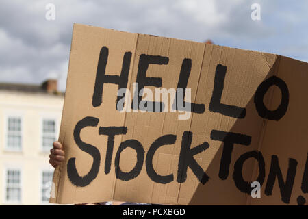 Stockton-on-Tees, UK. Saturday, 4th August, 2018. This 'Hello Stockton' placard starts a performance of '(In)visible Dancing' by Luca Silvestrini's Protein at the 31st Stockton International Riverside Festival. Credit: Andrew Nicholson/Alamy Live News Stock Photo