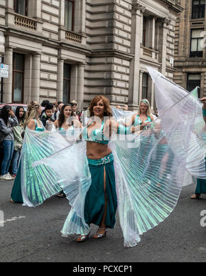 Glasgow, Scotland, UK. 04th August 2018. A group of belly dancers waiting for the start of the Carnival Procession of the Merchant City Festival. The festival is part of Festival 2018 a city-wide cultural event running in parallel with Glasgow 2018, the European Championships. Credit: Elizabeth Leyden/Alamy Live News Stock Photo