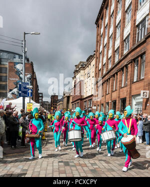 Glasgow, Scotland, UK. 04th August 2018. Costumed participants in the Carnival Procession of the Merchant City Festival. The festival is part of Festival 2018 a city-wide cultural event running in parallel with Glasgow 2018, the European Championships. Credit: Elizabeth Leyden/Alamy Live News Stock Photo