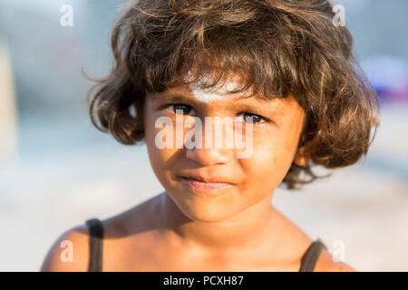 PONDICHERY, PUDUCHERRY, TAMIL NADU, INDIA - MARCH CIRCA, 2018. Unidentified Smiling face portrait of a young child or young girl from rural part of In Stock Photo