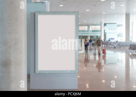 Blank billboard mock up in an airport, with unfocused background Stock Photo