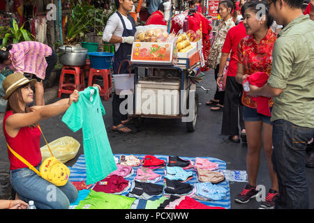 Street market in Chinatown at New Year, Yaowarat, Bangkok, Thailand Stock Photo