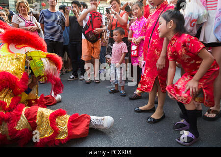 Lion dance in Chinatown at New Year, Yaowarat, Bangkok, Thailand Stock Photo