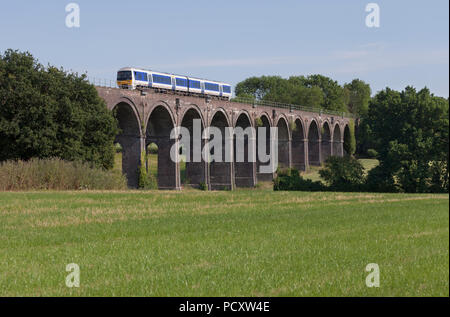 A Chiltern Railways class 165 turbo train crossing Saunderton Viaduct (south of Banbury) Stock Photo