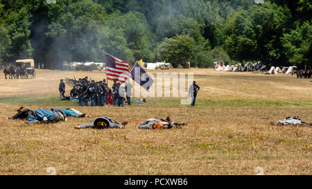 Duncan Mills, CA - July 14, 2018: Battlefield at the Northern California's Civil war reenactment featuring wounded confederate soldiers and union army Stock Photo