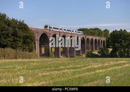 A Chiltern railways class 168 turbostar train crosses  Saunderton Viaduct (south of Banbury) with an express service for Marylebone Stock Photo