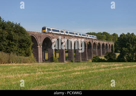 A Chiltern railways class 168 turbostar train crosses  Saunderton Viaduct (south of Banbury) with an express service for Birmingham Stock Photo