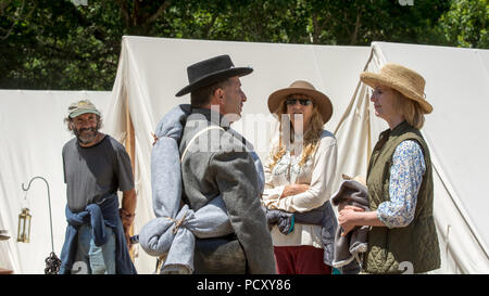 Duncan Mills, CA - July 14, 2018: Re-enactors interacting with the public at the Northern California's Civil war reenactment. This event is one of the Stock Photo