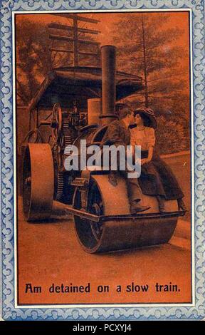 Am detained on a slow train. Two people kissing on a roller for road construction Stock Photo