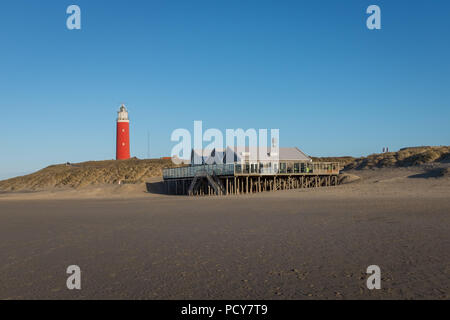 Lighthouse on the beach of Texel off the Dutch coast Stock Photo