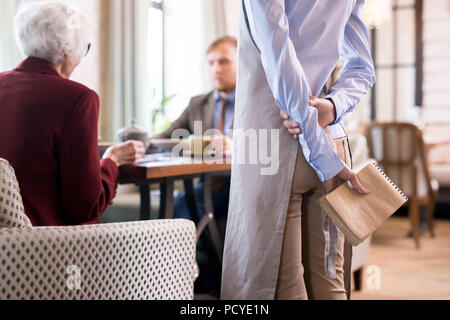 Waiter waiting for order Stock Photo