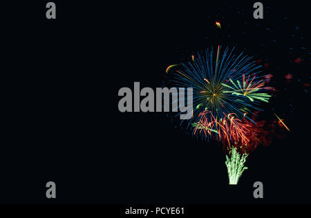 multicolored, clear fireworks on a black background isolated Stock Photo