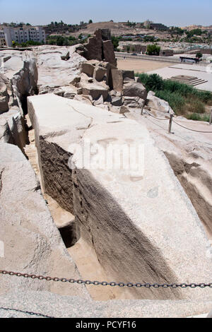 The unfinished obelisk, abandoned in the quarry after developing a crack, at Aswan, Egypt. Stock Photo