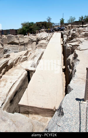 The unfinished obelisk, abandoned in the quarry after developing a crack, at Aswan, Egypt. Stock Photo