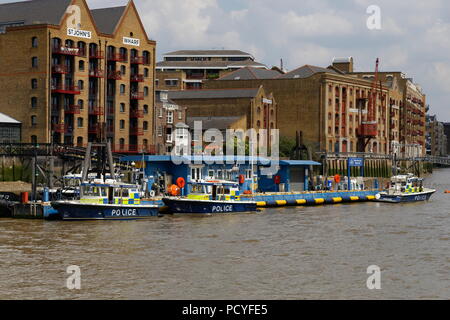 Thames Police by St Johns Wharf and Captain Kidd Pub River Thames London Stock Photo