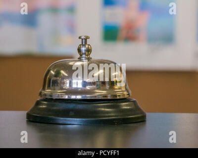 Service bell at an hotel table. Stock Photo