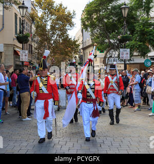 Members of the Gibraltar Re-enactment Association take part in a re-enacted Ceremony of the Keys on the British Overseas Territory of Gibraltar Stock Photo
