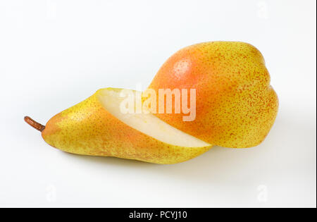 halved yellow pear on white background Stock Photo