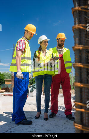 Architect supervising the work in progress on the construction Stock Photo