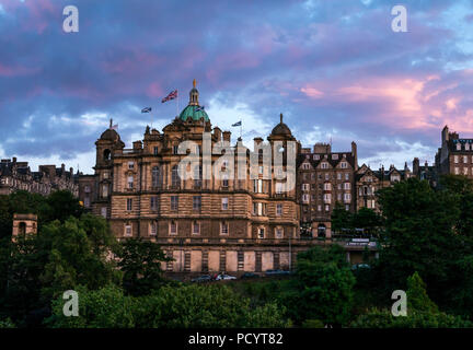 Bank of Scotland headquarters, Lloyds Banking Group, at dusk with colourful sky and pink clouds, The Mound, Edinburgh, Scotland, UK Stock Photo