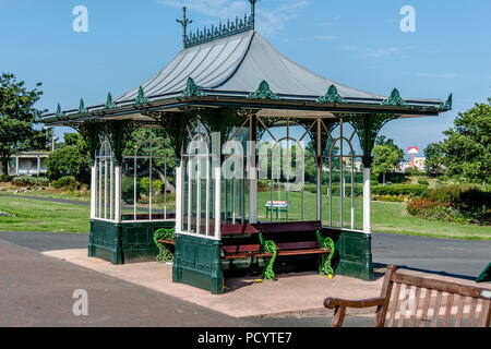 Victorian shelter in Kings Garden on Southport promenade. Green wrought iron work. Stock Photo