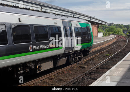 A West Midlands trains  class 172 diesel train at Worcester Foregate Street railway station showing the West Midlands railway logo Stock Photo