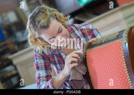 womanan working in upholstery workshop Stock Photo
