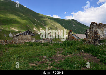 Beautiful Truso Gorge near the Kazbegi city in the mountains of the Caucasus, Ruin old village Stock Photo