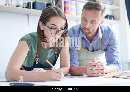 Working in team at workshop Stock Photo