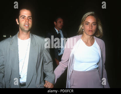 BEVERLY HILLS, CA - JUNE 3: (L-R) Actor Christopher Peters and actress Sharon Stone attend Paramount Pictures 'Patriot Games' Premiere on June 3, 1992 at the Academy of Motion Pictures Arts and Sciences Theatre in Beverly Hills, California. Photo by Barry King/Alamy Stock Photo Stock Photo