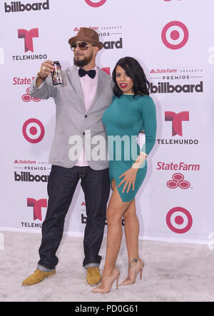 MIAMI, FL - APRIL 30:  Don Dinero and Luna Star arrives at 2015 Billboard Latin Music Awards presented by State Farm on Telemundo at Bank United Center on April 30, 2015 in Miami, Florida   People:  Don Dinero and Luna Star Stock Photo