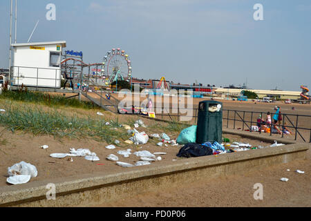 Overflowing rubbish bins and litter on Skegness Beach in Summer 2018. Ocean plastic. England, UK. Stock Photo