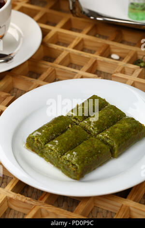 Pistachio rolls baklava,Fistik sarma, Turkish traditional dessert Stock Photo