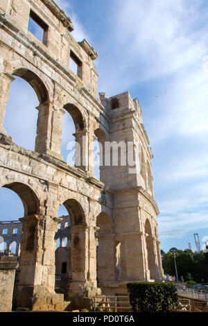 The Pula Arena is the name of the amphitheatre located in Pula, Croatia. The Arena is the only remaining Roman amphitheatre to have four side towers a Stock Photo