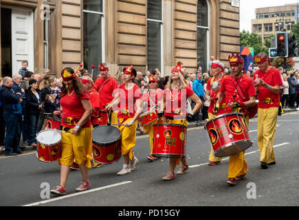 Samba band Bloco Fogo from Kent participating in the Carnival Procession of Glasgow's Merchant City Festival,.2018 Stock Photo