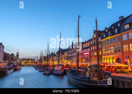 Copenhagen night city skyline at Nyhavn harbour, Copenhagen Denmark Stock Photo