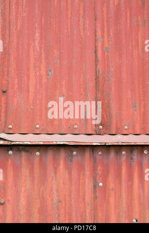 Rusting Corrugated sheets on a farm building as a background