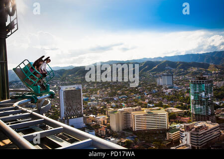 CEBU, PHILIPPINES-MARCH 25, 2016: Hang Higher- Urban roller coaster goes at the 37th floor on Crown Regency in Cebu city on March 25, 2016.  Philippin Stock Photo