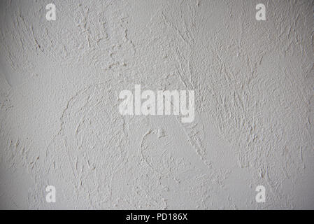Grey plaster background, cracked and textured leaden cement Stock Photo