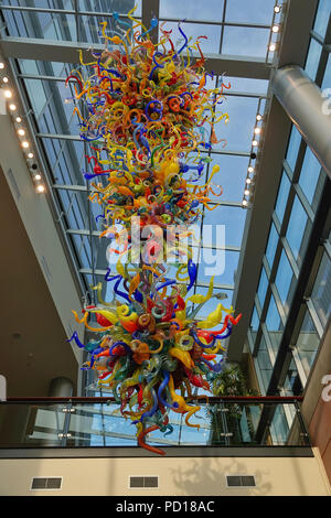 Chihuly glass chandelier named 'End of Day Chandelier' inside Lincoln Square building in downtown Bellevue, WA, USA Stock Photo