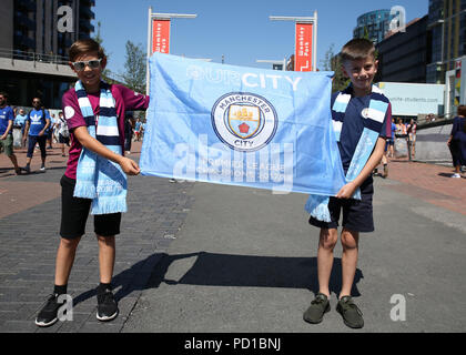 Wembley Stadium, London, UK. 5th Aug, 2018. FA Community Shield, Chelsea versus Manchester City; Pair of Manchester City fans hold up Premier League Champions 2017/18 flag Credit: Action Plus Sports/Alamy Live News Stock Photo